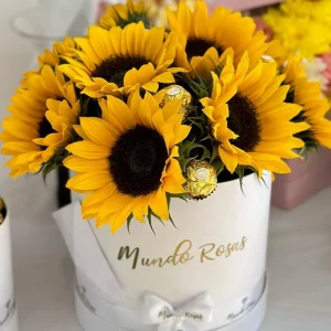 Caja de girasoles y chocolates